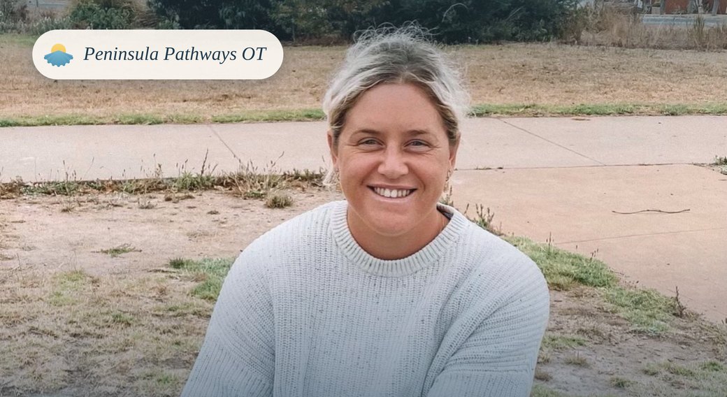 Louise, occupational therapist, sitting outdoors on the grass